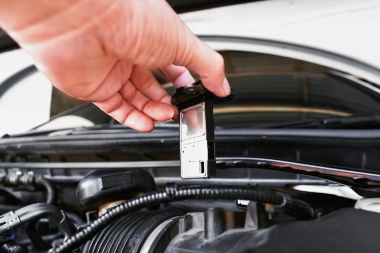 Débitmètre de voiture séché puis réinstaller